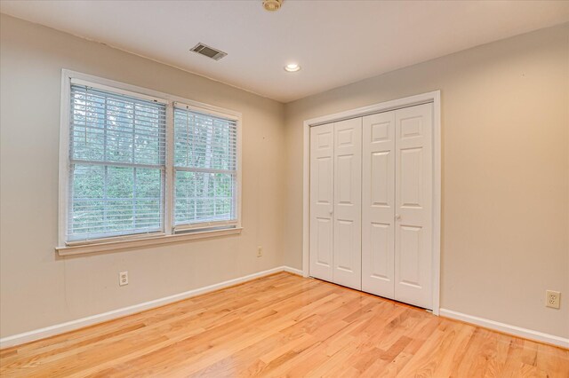 3696 El Cordero Ranch Springs Rd, Augusta, GA 30907 - unfurnished bedroom featuring baseboards, light wood-type flooring, recessed lighting, and a closet