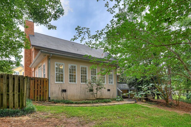3696 El Cordero Ranch Springs Rd, Augusta, GA 30907 - rear view of property with stucco siding and a chimney