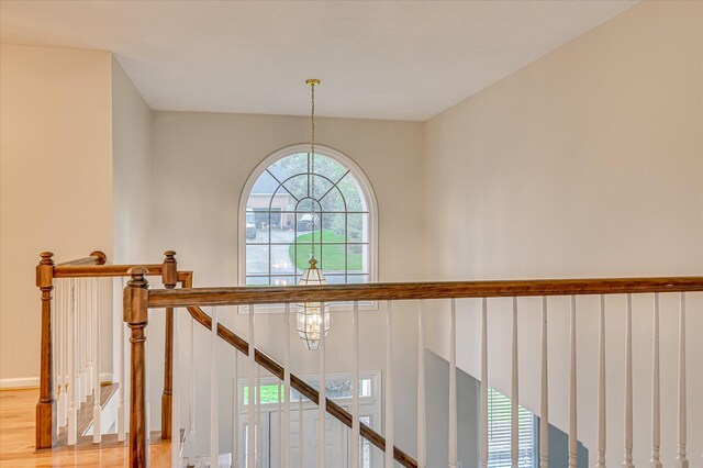 3696 El Cordero Ranch Springs Rd, Augusta, GA 30907 - stairway with wood finished floors and a chandelier