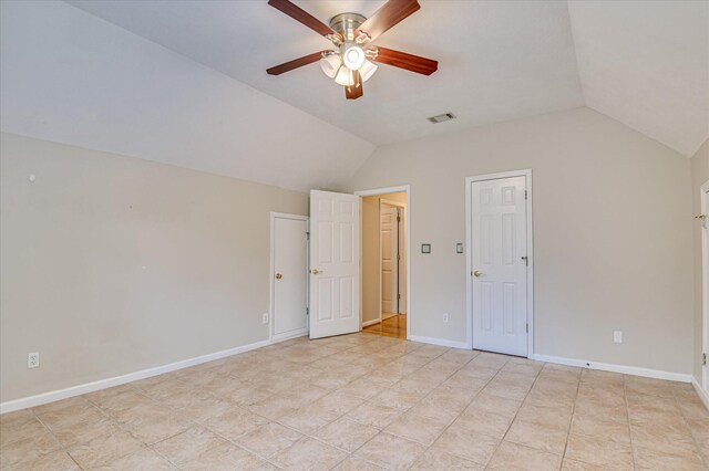 3696 El Cordero Ranch Springs Rd, Augusta, GA 30907 - unfurnished bedroom with lofted ceiling, light tile patterned floors, and ceiling fan