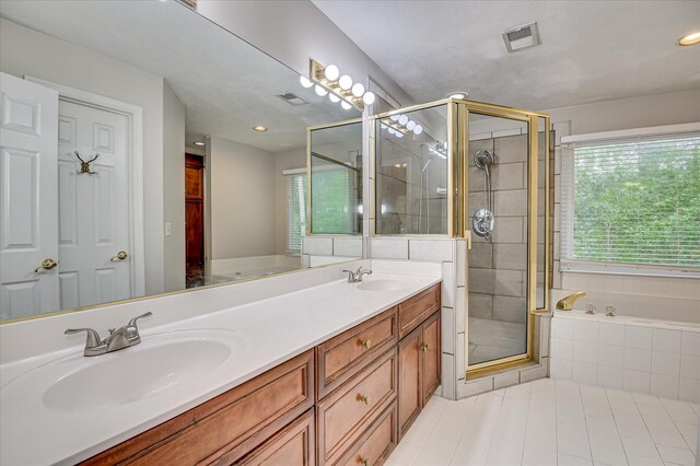 3696 El Cordero Ranch Springs Rd, Augusta, GA 30907 - full bathroom with a garden tub, a shower stall, tile patterned flooring, double vanity, and recessed lighting