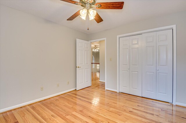 3696 El Cordero Ranch Springs Rd, Augusta, GA 30907 - unfurnished bedroom with light wood-style floors, baseboards, a closet, and ceiling fan