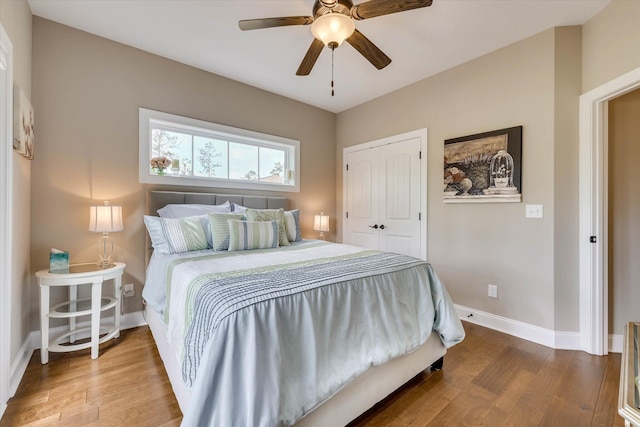 137 Elgin Ln, Mccormick, SC 29835 - bedroom featuring baseboards, a closet, a ceiling fan, and wood finished floors