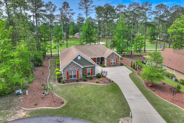 137 Elgin Ln, Mccormick, SC 29835 - view of front of house with stone siding, concrete driveway, and a front yard