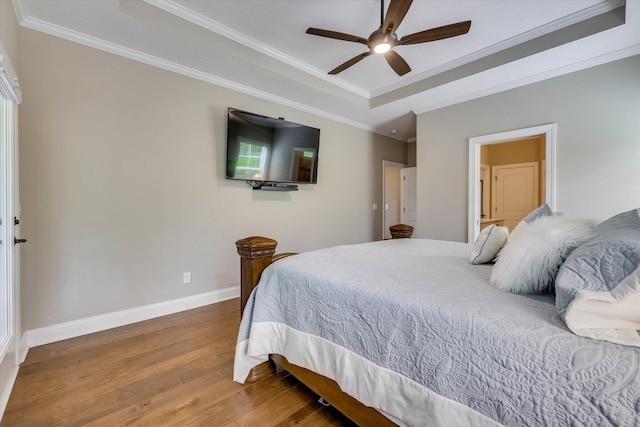 137 Elgin Ln, Mccormick, SC 29835 - bedroom with baseboards, a raised ceiling, ornamental molding, and hardwood / wood-style flooring