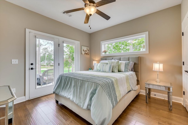 137 Elgin Ln, Mccormick, SC 29835 - bedroom featuring baseboards, access to outside, visible vents, and wood finished floors