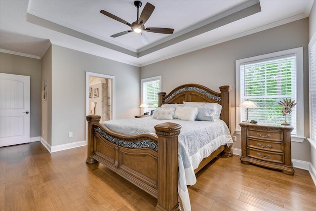 137 Elgin Ln, Mccormick, SC 29835 - bedroom with a tray ceiling, crown molding, baseboards, and hardwood / wood-style flooring