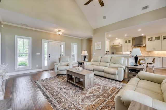 137 Elgin Ln, Mccormick, SC 29835 - living area with lofted ceiling, baseboards, ceiling fan, visible vents, and wood finished floors