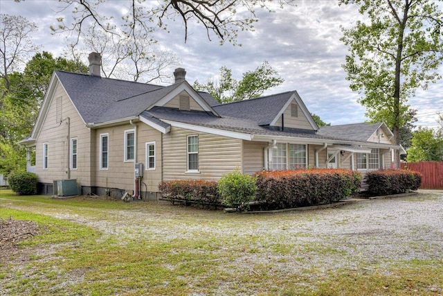 view of home's exterior with central AC unit