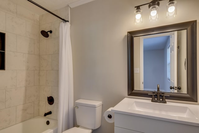 bathroom featuring shower / tub combo, vanity, and toilet