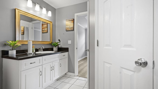 1518 Sandstone Ln, Hephzibah, GA 30815 - bathroom featuring vanity, baseboards, and tile patterned floors