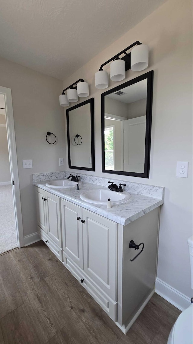 1759 Storm Branch Rd, Beech Island, SC 29842 - bathroom featuring wood finished floors and double vanity