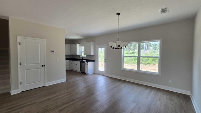 1759 Storm Branch Rd, Beech Island, SC 29842 - unfurnished living room with a chandelier, dark wood finished floors, and stairs