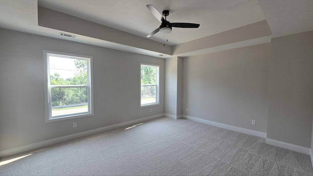 1759 Storm Branch Rd, Beech Island, SC 29842 - empty room with a raised ceiling, carpet, and a ceiling fan
