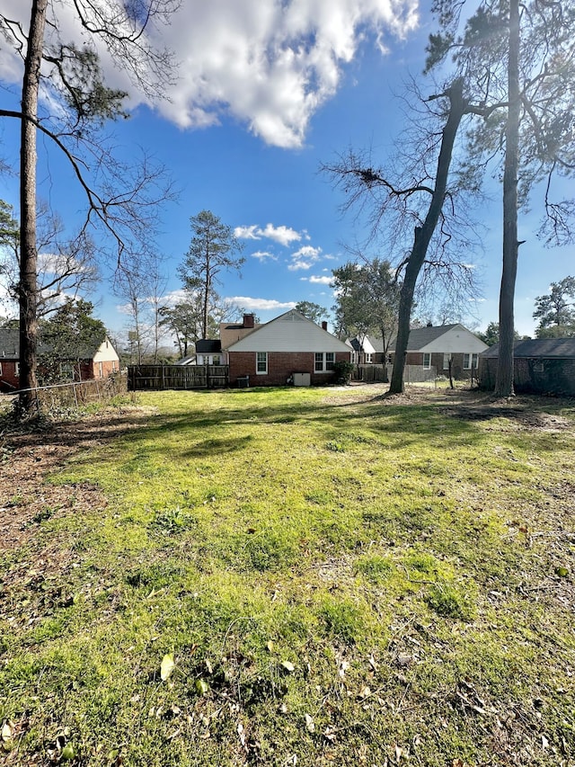 view of yard with fence