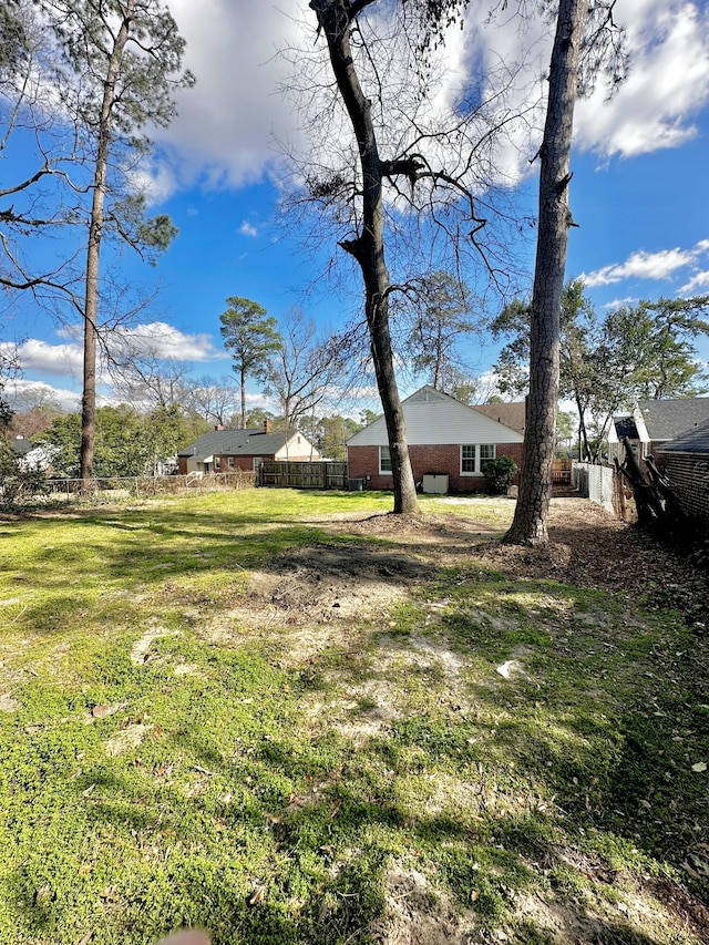 view of yard with fence