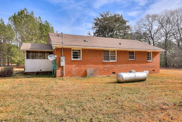 1775 Metasville Rd, Lincolnton, GA 30817 - back of house with a sunroom, crawl space, brick siding, and a lawn