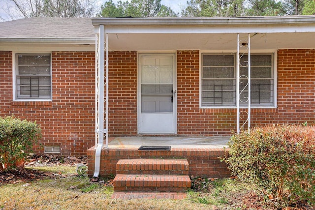 1775 Metasville Rd, Lincolnton, GA 30817 - doorway to property featuring a shingled roof, crawl space, and brick siding