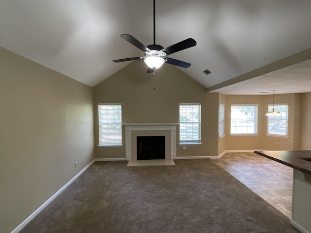 930 Hunting Horn Way, Evans, GA 30809 - unfurnished living room with baseboards, a fireplace with flush hearth, a ceiling fan, carpet flooring, and vaulted ceiling