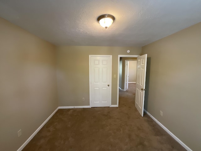 930 Hunting Horn Way, Evans, GA 30809 - unfurnished room with baseboards, carpet floors, and a textured ceiling