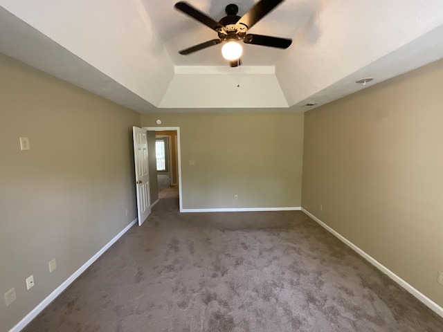 930 Hunting Horn Way, Evans, GA 30809 - carpeted empty room featuring a raised ceiling, ceiling fan, and baseboards