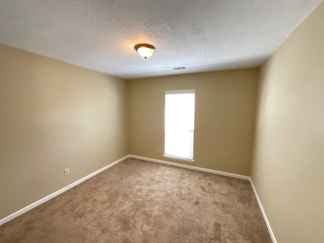 930 Hunting Horn Way, Evans, GA 30809 - carpeted empty room with baseboards and a textured ceiling