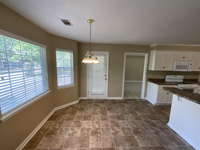 930 Hunting Horn Way, Evans, GA 30809 - kitchen with white appliances, dark countertops, white cabinetry, pendant lighting, and baseboards