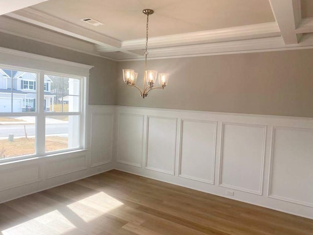 323 Granard St, Grovetown, GA 30813 - unfurnished dining area featuring a decorative wall, coffered ceiling, a chandelier, healthy amount of natural light, and beamed ceiling