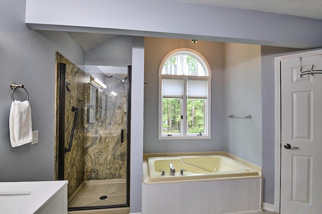 123 Tara Dr, Mccormick, SC 29835 - full bathroom with a garden tub, a marble finish shower, and vanity