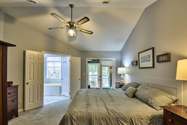 123 Tara Dr, Mccormick, SC 29835 - bedroom with lofted ceiling, light carpet, multiple windows, ensuite bath, and baseboards