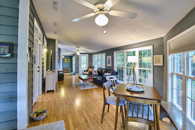 123 Tara Dr, Mccormick, SC 29835 - dining area featuring a textured ceiling, a ceiling fan, and light wood-style flooring