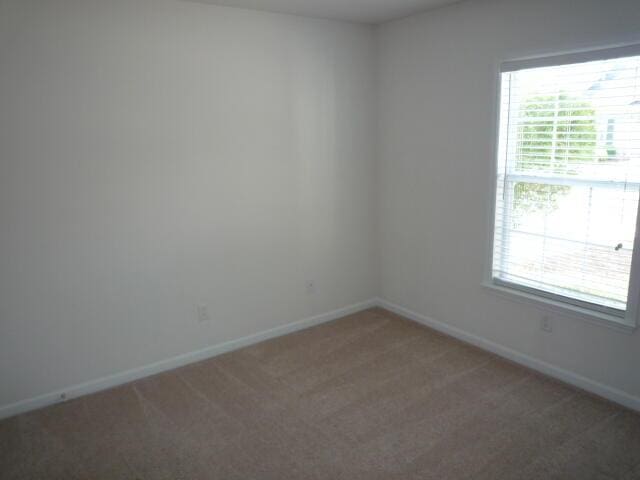7423 Exuma Dr, Augusta, GA 30909 - unfurnished room featuring light carpet and baseboards