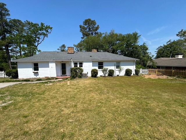 2210 Glendale Rd, Augusta, GA 30904 - view of front facade with a front lawn, a chimney, and fence