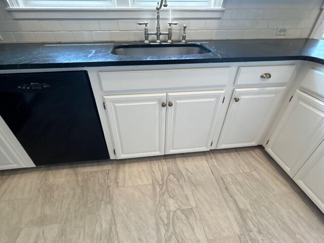 2210 Glendale Rd, Augusta, GA 30904 - kitchen with a sink, dark countertops, dishwasher, and white cabinetry