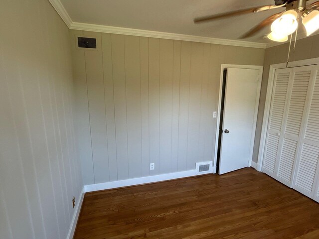 2210 Glendale Rd, Augusta, GA 30904 - unfurnished bedroom with crown molding, visible vents, ceiling fan, baseboards, and dark wood finished floors