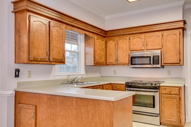 kitchen featuring appliances with stainless steel finishes, light countertops, a peninsula, and ornamental molding