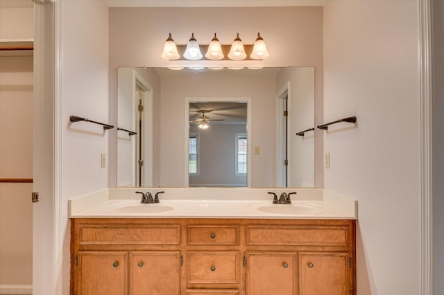 full bath with double vanity and a sink