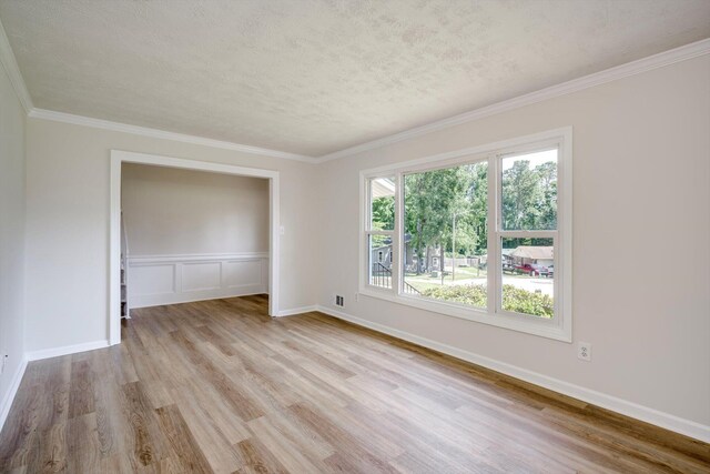 209 Biltmore Ct, Martinez, GA 30907 - unfurnished dining area with a chandelier, dark wood-type flooring, ornamental molding, and a wainscoted wall