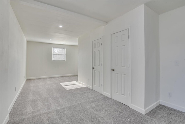 basement with light colored carpet