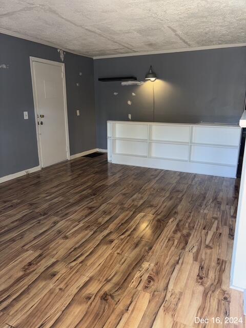 unfurnished living room with hardwood / wood-style floors