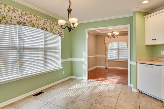 790 Osprey Ln, Martinez, GA 30907 - unfurnished dining area featuring a chandelier, crown molding, light tile patterned floors, baseboards, and recessed lighting