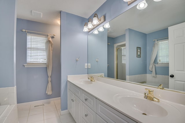 790 Osprey Ln, Martinez, GA 30907 - bathroom with a garden tub, a shower stall, double vanity, and healthy amount of natural light