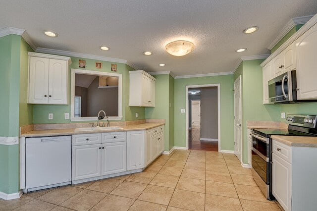 790 Osprey Ln, Martinez, GA 30907 - kitchen featuring stainless steel appliances, a sink, white cabinets, recessed lighting, and light countertops