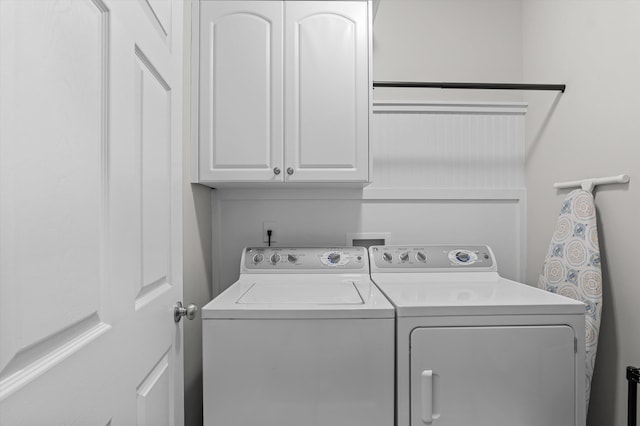 1109 Highmoor Ln, Evans, GA 30809 - laundry area featuring separate washer and dryer and cabinet space
