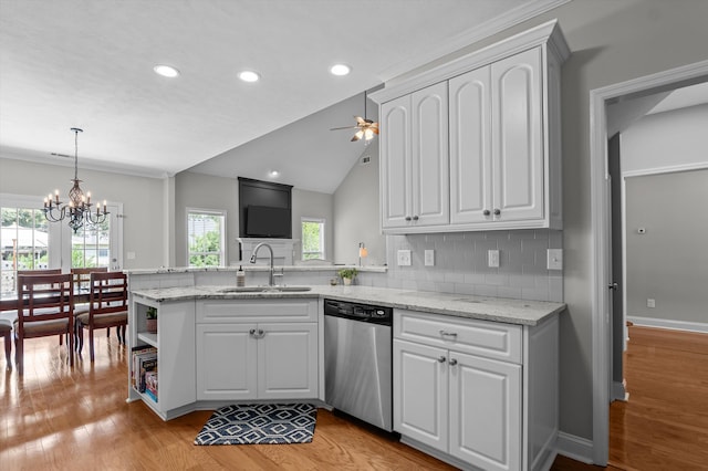 1109 Highmoor Ln, Evans, GA 30809 - kitchen with dishwasher, a peninsula, a chandelier, light wood finished floors, and recessed lighting