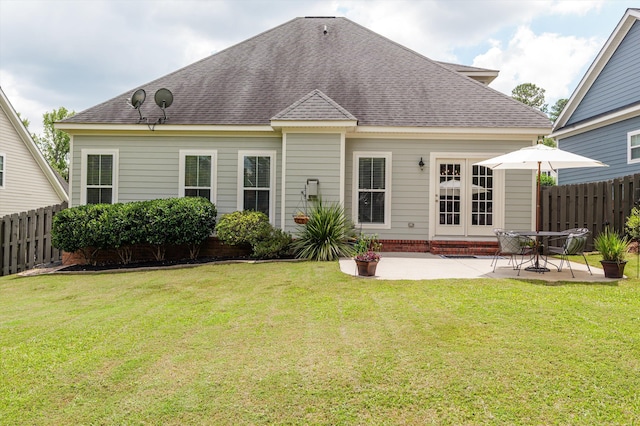 1109 Highmoor Ln, Evans, GA 30809 - back of property with a shingled roof and a patio