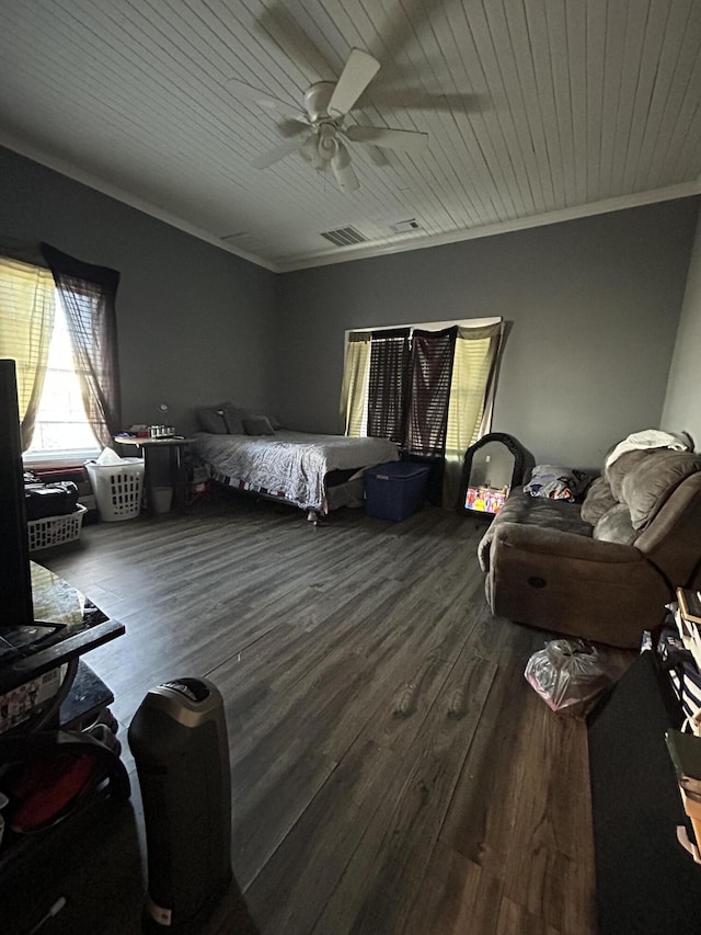 bedroom with ornamental molding, wood ceiling, visible vents, and wood finished floors