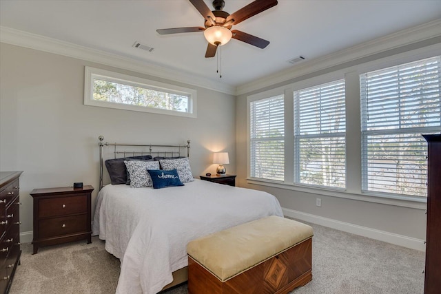 bedroom featuring light carpet, ornamental molding, and visible vents