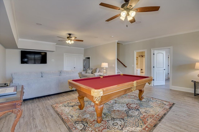 recreation room featuring baseboards, billiards, ornamental molding, and wood finished floors