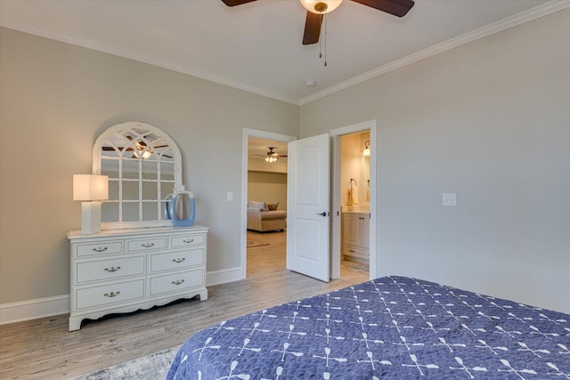 bedroom with ceiling fan, connected bathroom, baseboards, light wood-style floors, and ornamental molding